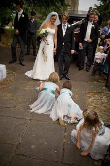 Description: C:\Users\Will\Desktop\Wedding Photography Gallery\small\Picking up money.jpg